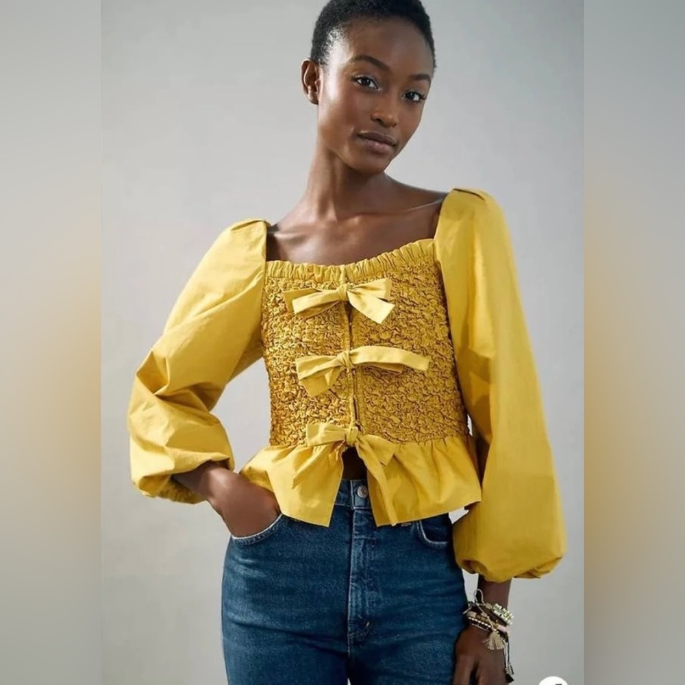 Yellow Anthropologie Smocked Bow-Tie Blouse